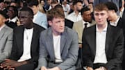 May 12, 2025; Chicago, Illinois, US; Duke players R-L Cooper Flagg, Kon Knueppel,and Khaman Maluach. during the 2025 NBA Draft Lottery at McCormick Place. Mandatory Credit: David Banks-Imagn Images