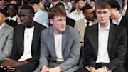 May 12, 2025; Chicago, Illinois, US; Duke players R-L Cooper Flagg, Kon Knueppel and Khaman Maluach during the 2025 NBA Draft Lottery at McCormick Place. Mandatory Credit: David Banks-Imagn Images