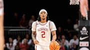 Arkansas Razorbacks guard Boogie Fland (2) brings the ball up court during the first half against the Illinois Fighting Illini at T-Mobile Center. 
