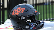 Oct 25, 2025; Lubbock, Texas, USA;  A general view of an Oklahoma State Cowboys helmet on the bench in the second half of the game against the Texas Tech Red Raiders at Jones AT&T Stadium. Mandatory Credit: Michael C. Johnson-Imagn Images