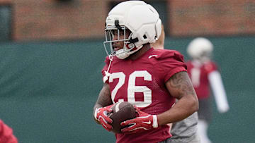 Running back Jam Miller completes a drill during Spring Practice for the Crimson Tide.