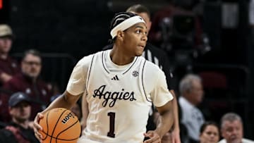 Feb 11, 2025; College Station, Texas, USA; Texas A&M Aggies guard Zhuric Phelps (1) dribbles the ball during the second half against the Georgia Bulldogs at Reed Arena. Mandatory Credit: Maria Lysaker-Imagn Images 