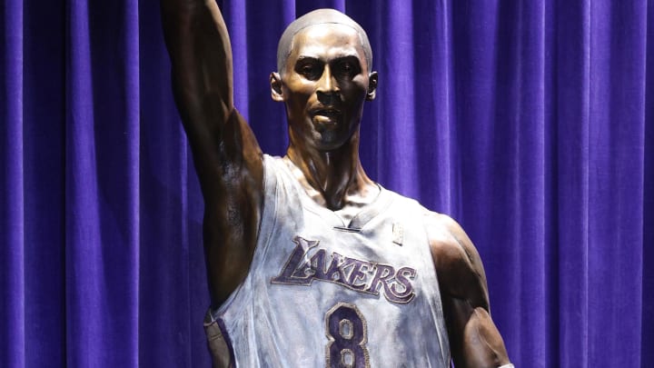 Feb 8, 2024; Los Angeles, CA, USA; A statue for former Los Angeles Lakers guard Kobe Bryant is unveiled during a ceremony at Star Plaza outside of Crypto.com Arena Mandatory Credit: Jason Parkhurst-USA TODAY Sports