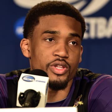 Mar 20, 2014; St. Louis, MO, USA; Kansas State Wildcats guard Shane Southwell (1) addresses the media at a press conference during their practice session prior to the 2nd round of the 2014 NCAA Men's Basketball Championship at Scottrade Center. Mandatory Credit: Scott Rovak-USA TODAY Sports