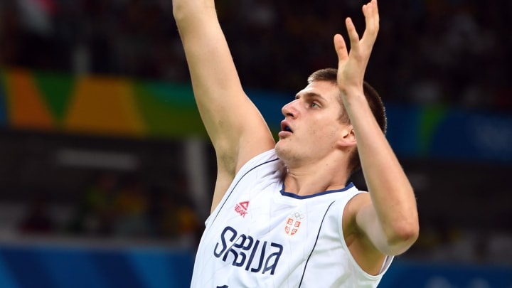 Aug 21, 2016; Rio de Janeiro, Brazil; Serbia center Nikola Jokic (14) shoots the ball against USA in the men's basketball gold medal match during the Rio 2016 Summer Olympic Games at Carioca Arena 1. 