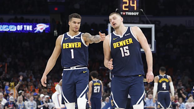 Denver Nuggets striker Michael Porter Jr. (1) and the Nikola Jokic Center (15)