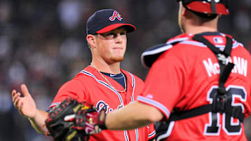 Jul 26, 2013; Atlanta, GA, USA; Atlanta Braves relief pitcher Craig Kimbrel (46) and catcher Brian McCann (16) react after defeating the St. Louis Cardinals at Turner Field. The Braves defeated the Cardinals 4-1. Mandatory Credit: Dale Zanine-Imagn Images