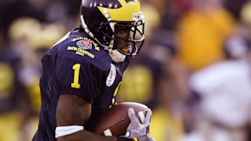 Jan 1, 2004; Pasadena, CA, USA: FILE PHOTO; Michigan Wolverines wide receiver Braylon Edwards (1) in action against the Southern California Trojans during the 2004 Rose Bowl at the Rose Bowl. The Trojans defeated the Wolverines 28-14.