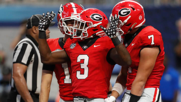 Georgia running back Nate Frazier (3) celebrates after scoring a touchdown during the second half of the NCAA Aflac Kickoff Game against Clemson in Atlanta, on Saturday, Aug. 31, 2024.