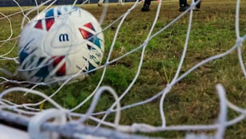 A goal scored by Wolfson's Raphael Eccher (9), not visibly seen has South Walton's goalkeeper Graham Wilde (1) looking back at the net during the first half of the FHSAA Region 1-3A high school boys soccer final Wednesday, Feb. 19, 2025 at Wolfson High School in Jacksonville, Fla.