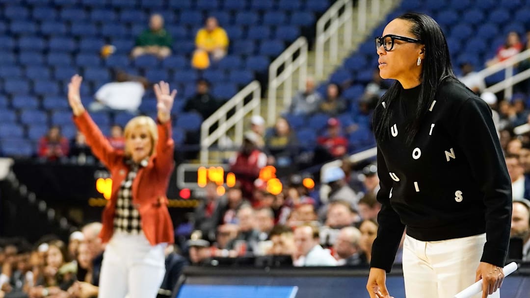 Mar 30, 2019; Greensboro, NC, USA; Baylor Lady Bears head coach Kim Mulkey and South Carolina Gamecocks head coach Dawn Staley both yell to their teams during the second half in the semifinals of the Greensboro regional in the women's 2019 NCAA Tournament at Greensboro Coliseum. Mandatory Credit: Jim Dedmon-Imagn Images