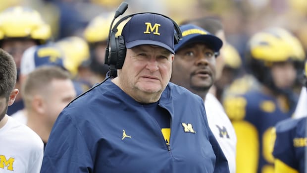 Michigan assistant head coach Biff Poggi on the sideline in the first half against Central Michigan