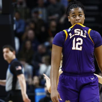 Apr 1, 2024; Albany, NY, USA; LSU Lady Tigers guard Mikaylah Williams (12) reacts in the fourth quarter against the Iowa Hawkeyes in the finals of the Albany Regional in the 2024 NCAA Tournament at MVP Arena. Mandatory Credit: Winslow Townson-USA TODAY Sports