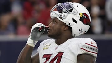 Nov 19, 2023; Houston, Texas, USA; Arizona Cardinals offensive tackle D.J. Humphries (74) smells smelling salts as he and the Houston Texans waits for a call in the second half at NRG Stadium. Mandatory Credit: Thomas Shea-Imagn Images