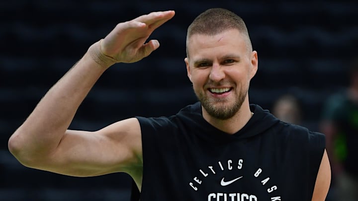 May 14, 2025; Boston, Massachusetts, USA; Boston Celtics center Kristaps Porzingis (8) reacts prior to game five of the second round for the 2025 NBA Playoffs against the New York Knicks at TD Garden. Mandatory Credit: Bob DeChiara-Imagn Images