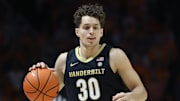 Feb 15, 2025; Knoxville, Tennessee, USA; Vanderbilt Commodores guard Chris Manon (30) `but against the Tennessee Volunteers during the first half at Thompson-Boling Arena at Food City Center. Mandatory Credit: Randy Sartin-Imagn Images