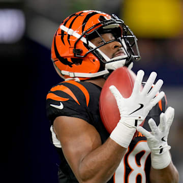 Cincinnati Bengals wide receiver Isaiah Williams (18) makes a catch during warm-ups before facing the Dallas Cowboys for Monday Night Football at AT&T Stadium on Monday, December 9, 2024.