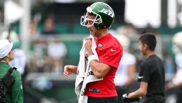 Jul 25, 2024; Florham Park, NJ, USA; New York Jets quarterback Aaron Rodgers (8) participates in a drill during training camp at Atlantic Health Jets Training Center.