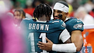 Feb 9, 2025; New Orleans, LA, USA; Philadelphia Eagles wide receiver A.J. Brown (11) hugs quarterback Jalen Hurts (1) during the second half of Super Bowl LIX at Caesars Superdome. Mandatory Credit: Geoff Burke-Imagn Images