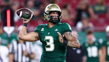 Sep 21, 2024; Tampa, Florida, USA; South Florida Bulls quarterback Bryce Archie (3) drops back to pass against the Miami Hurricanes in the fourth quarter at Raymond James Stadium. Mandatory Credit: Nathan Ray Seebeck-Imagn Images
