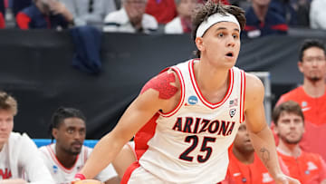 Kerr Kriisa (25) played his first three seasons of college basketball at Arizona.