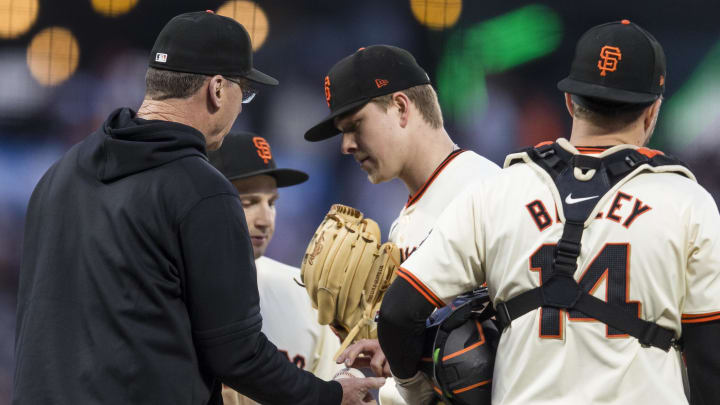 Jun 10, 2024; San Francisco, California, USA; San Francisco Giants manager Bob Melvin (6) lifts starting pitcher Kyle Harrison (45) during the seventh inning of the game against the Houston Astros at Oracle Park. Mandatory Credit: John Hefti-USA TODAY Sports