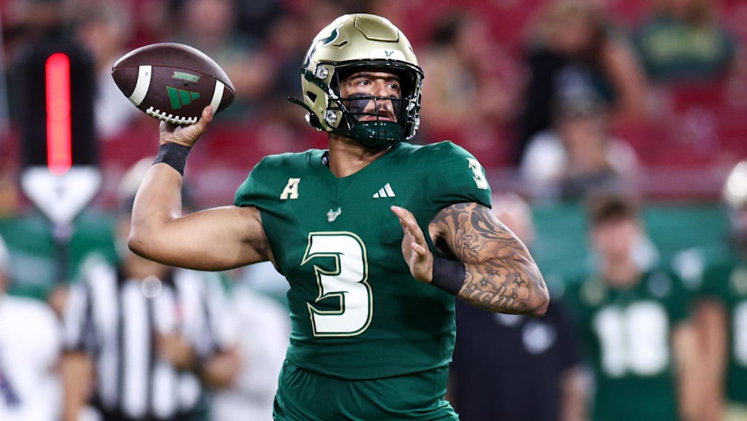 Sep 21, 2024; Tampa, Florida, USA; South Florida Bulls quarterback Bryce Archie (3) drops back to pass against the Miami Hurricanes in the fourth quarter at Raymond James Stadium. Mandatory Credit: Nathan Ray Seebeck-Imagn Images
