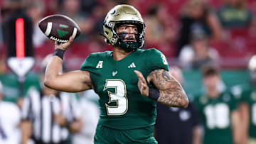 Sep 21, 2024; Tampa, Florida, USA; South Florida Bulls quarterback Bryce Archie (3) drops back to pass against the Miami Hurricanes in the fourth quarter at Raymond James Stadium. Mandatory Credit: Nathan Ray Seebeck-Imagn Images