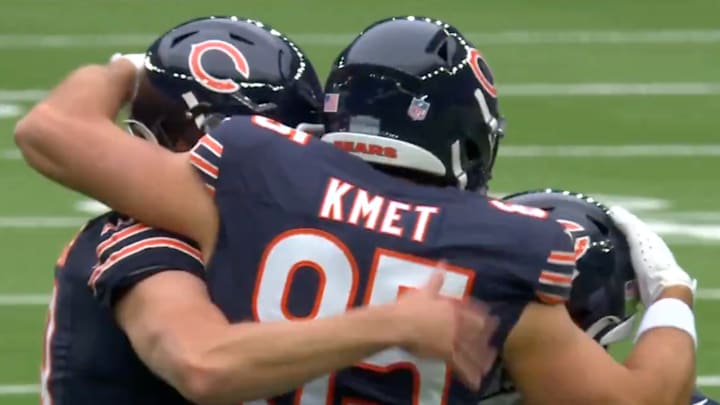 Chicago Bears tight end Cole Kmet celebrates after stepping in as the emergency long snapper.