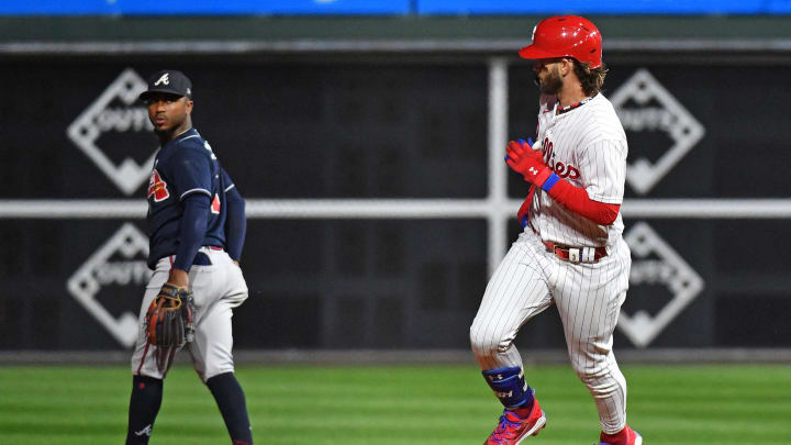 Oct 11, 2023; Philadelphia, Pennsylvania, USA;  Philadelphia Phillies first baseman Bryce Harper (3) hits a solo home run during the fifth inning against the Atlanta Braves in game three of the NLDS for the 2023 MLB playoffs at Citizens Bank Park. Mandatory Credit: Eric Hartline-USA TODAY Sports