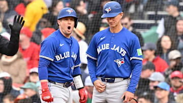 Apr 10, 2025: Toronto Blue Jays catcher Tyler Heineman (55) reacts to reacts to hitting a one run single during the seventh inning against the Boston Red Sox at Fenway Park. 