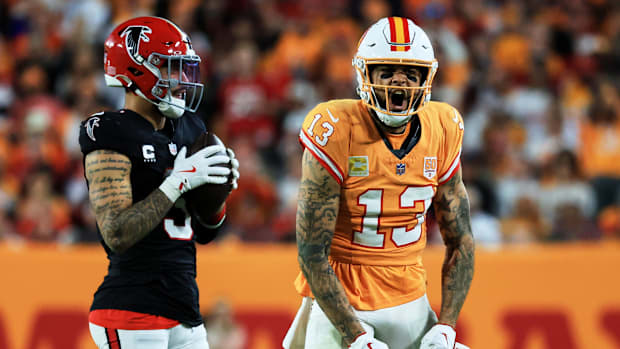 Tampa Bay Buccaneers wide receiver Mike Evans reacts after catching a pass against Atlanta Falcons safety Jessie Bates III.
