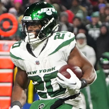 Nov 19, 2023; Orchard Park, New York, USA; New York Jets running back Breece Hall (20) runs with the ball against the Buffalo Bills during the second half at Highmark Stadium