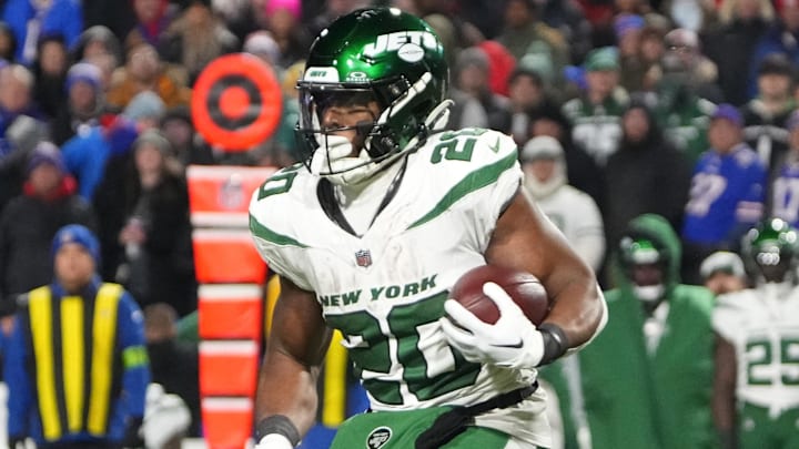 Nov 19, 2023; Orchard Park, New York, USA; New York Jets running back Breece Hall (20) runs with the ball against the Buffalo Bills during the second half at Highmark Stadium