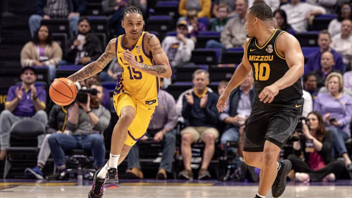 Mar 9, 2024; Baton Rouge, Louisiana, USA; LSU Tigers forward Tyrell Ward (15) brings the ball up court against Missouri Tigers guard Nick Honor (10) during the first half at Pete Maravich Assembly Center. Mandatory Credit: Stephen Lew-Imagn Images Mar 9, 2024; Baton Rouge, Louisiana, USA; LSU Tigers forward Tyrell Ward (15) brings the ball up court against Missouri Tigers guard Nick Honor (10) during the first half at Pete Maravich Assembly Center. Mandatory Credit: Stephen Lew-Imagn Images