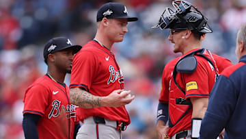 May 29, 2025; Philadelphia, Pennsylvania, USA; Atlanta Braves pitcher AJ Smith-Shawver (32) talks with catcher Sean Murphy (12) before leaving the game during the third inning against the Philadelphia Phillies at Citizens Bank Park. Mandatory Credit: Bill Streicher-Imagn Images