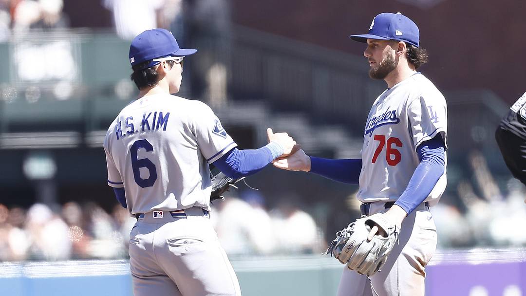 Apr 23, 2026; San Francisco, California, USA; Los Angeles Dodgers shortstop Hyeseong Kim (6) celebrates with second baseman Alex Freeland (76) after the game against the San Francisco Giants at Oracle Park. Mandatory Credit: Kelley L Cox-Imagn Images