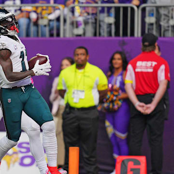 Oct 19, 2025; Minneapolis, Minnesota, USA; Philadelphia Eagles wide receiver A.J. Brown (11) catches a pass for a touchdown during the first half against the Minnesota Vikings at U.S. Bank Stadium. Mandatory Credit: Brad Rempel-Imagn Images