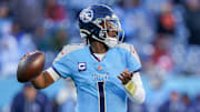 Tennessee Titans quarterback Cam Ward (1) looks downfield during the fourth quarter against the Jacksonville Jaguars at Nissan Stadium in Nashville, Tenn., Sunday, Nov. 30, 2025.