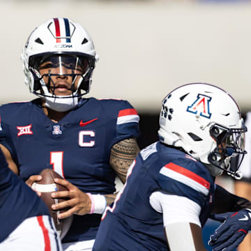 Nov 8, 2025; Tucson, Arizona, USA; Arizona Wildcats quarterback Noah Fifita (1) against the Kansas Jayhawks in the first half at Arizona Stadium. Mandatory Credit: Mark J. Rebilas-Imagn Images