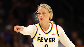 Aug 7, 2025; Phoenix, Arizona, USA; Indiana Fever guard Sophie Cunningham (8) reacts against the Phoenix Mercury during an WNBA game at PHX Arena. Mandatory Credit: Mark J. Rebilas-Imagn Images