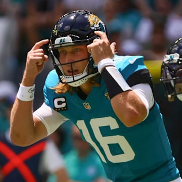 Sep 8, 2024; Miami Gardens, Florida, USA; Jacksonville Jaguars quarterback Trevor Lawrence (16) reacts from the field against the Miami Dolphins during the first quarter at Hard Rock Stadium. Mandatory Credit: Sam Navarro-Imagn Images