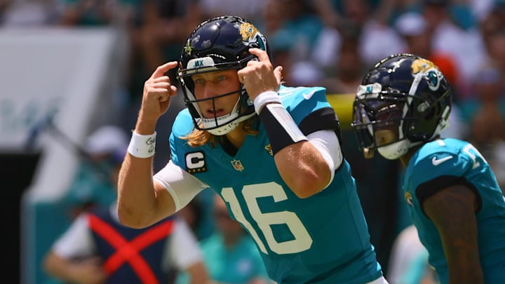 Sep 8, 2024; Miami Gardens, Florida, USA; Jacksonville Jaguars quarterback Trevor Lawrence (16) reacts from the field against the Miami Dolphins during the first quarter at Hard Rock Stadium. Mandatory Credit: Sam Navarro-Imagn Images