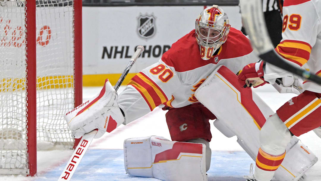 Apr 17, 2025; Los Angeles, California, USA;  Calgary Flames goaltender Dan Vladar (80) makes a save during the second period against the Los Angeles Kings at Crypto.com Arena.