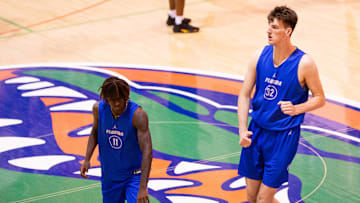 Florida Gators center Olivier Rioux (32) runs Karaokes as the Florida Gators men’s basketball team held a practice on John W. Frost II Practice Court in Gainesville, FL on Tuesday, September 24, 2024. [Doug Engle/Gainesville Sun]