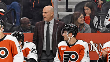 Oct 16, 2025; Philadelphia, Pennsylvania, USA; Philadelphia Flyers head coach Rick Tocchet behind the bench against the Winnipeg Jets at Wells Fargo Center. Mandatory Credit: Eric Hartline-Imagn Images