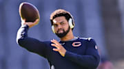 Oct 6, 2024; Chicago, Illinois, USA; Chicago Bears quarterback Caleb Williams (18) warms up before the game against the Carolina Panthers at Soldier Field. Mandatory Credit: Daniel Bartel-Imagn Images