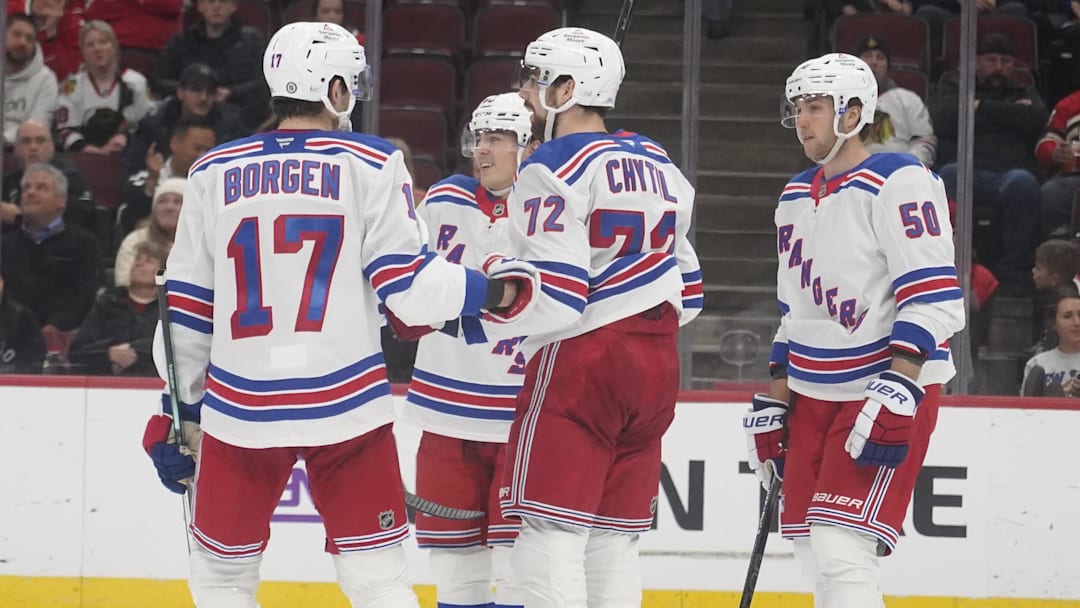 Jan 5, 2025; Chicago, Illinois, USA; New York Rangers center Filip Chytil (72) celebrates his goal against the Chicago Blackhawks with Will Borgen (17) during the third period at United Center. Mandatory Credit: David Banks-Imagn Images