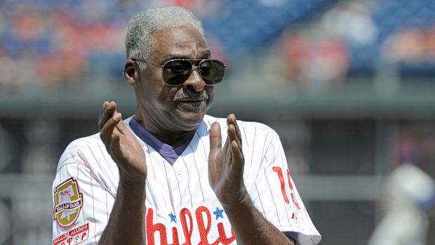 Philadelphia Phillies former player Dick Allen claps during Phillies alumni ceremony prior to game against the New York Mets.