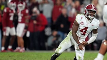 Alabama Crimson Tide quarterback Jalen Milroe (4) gets up after throwing an interception during a college football game between the University of Oklahoma Sooners (OU) and the Alabama Crimson Tide at Gaylord Family - Oklahoma Memorial Stadium in Norman, Okla., Saturday, Nov. 23, 2024. Oklahoma won 24-3.